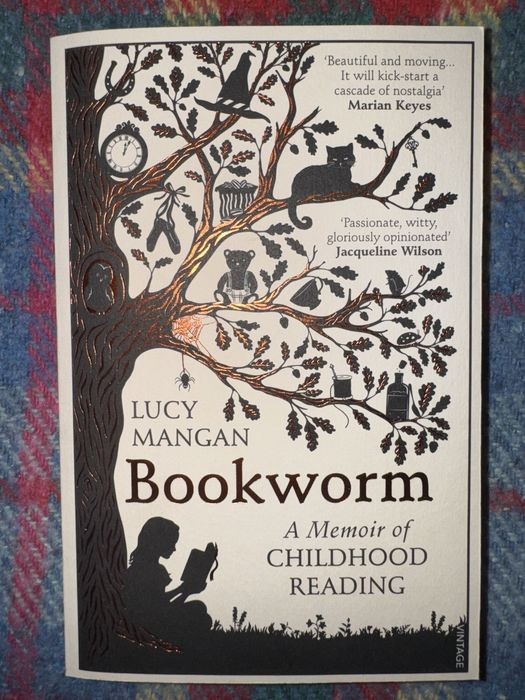 Л. Манган. Книжковий черв'як: Спогади про дитяче читання